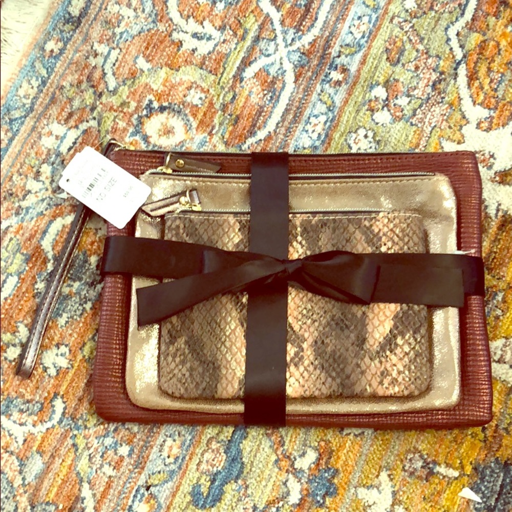 NWT Neiman Marcus zipped pouch set